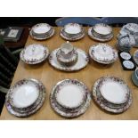 A ROYAL DOULTON TRANSFER DECORATED DINNER SERVICE decorated in the 'English Rose' pattern
