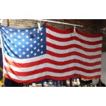 A LARGE VINTAGE AMERICAN FLAG, 135" length x 63"