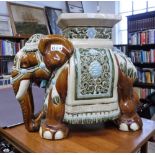 A GLAZED GARDEN SEAT, modelled as an elephant