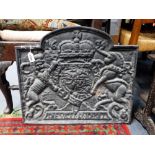 A HEAVY CAST-IRON FIRE BACK with armorial crest