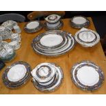 A BURLEIGH WARE TRANSFER DECORATED DINNER SERVICE with floral bands