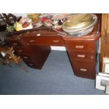 A MAHOGANY BREAKFRONT DRESSING TABLE, 49" wide