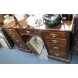 A LATE VICTORIAN WALNUT DRESSING TABLE