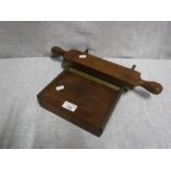 A VICTORIAN PHARMACIST'S MAHOGANY AND BRASS PILL MAKER by J.W. Pindar & Co, Brockley, London