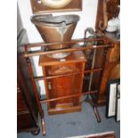 A LATE VICTORIAN WALNUT POT CUPBOARD, a towel rail, a folding cake stand and a copper coal scuttle