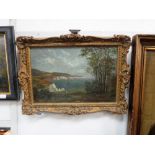 A 19TH CENTURY OIL ON CANVAS VIEW OF THE ISLE OF WIGHT, indistinctly signed in a gilt frame