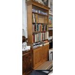 A GEORGE III STYLE PINE LIBRARY BOOKCASE with adjustable shelves, 93" high x 39" wide