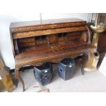 A DUTCH MARQUETRY CYLINDER BUREAU with all over inlaid decoration, fitted interior above two drawers