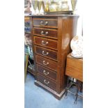 AN EDWARDIAN MAHOGANY AND SATINWOOD CROSSBANDED WELLINGTON CHEST, 48" high x 22.5" wide (key in