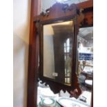 A GEORGE III WALNUT FRAMED MIRROR, 25.5" high and a 1920s oak framed mirror
