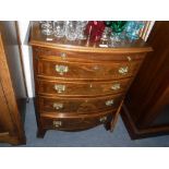 A REPRODUCTION BOWFRONTED MAHOGANY CHEST OF DRAWERS of small proportions, with brushing slide, 30.5"