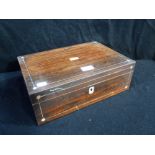 A 19TH CENTURY ROSEWOOD AND MOTHER-OF-PEARL INLAID WRITING SLOPE with fitted interior, 14" long