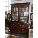 A 19TH CENTURY MAHOGANY LIBRARY BOOKCASE, with glazed upper section, the base fitted drawers with
