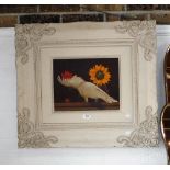 A COCKATOO WITH SUNFLOWER AND CHERRY, oil on board in a white painted carved frame