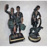 A PAIR OF FRENCH RESIN ART DECO STYLE FIGURES on turned marble effect stands
