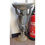 A LEAD GARDEN BIRD BATH supported by a winged cherub, 29" high