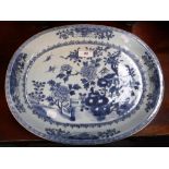 AN 18TH CENTURY CHINESE EXPORT BLUE AND WHITE DISH of oval form, 14" wide