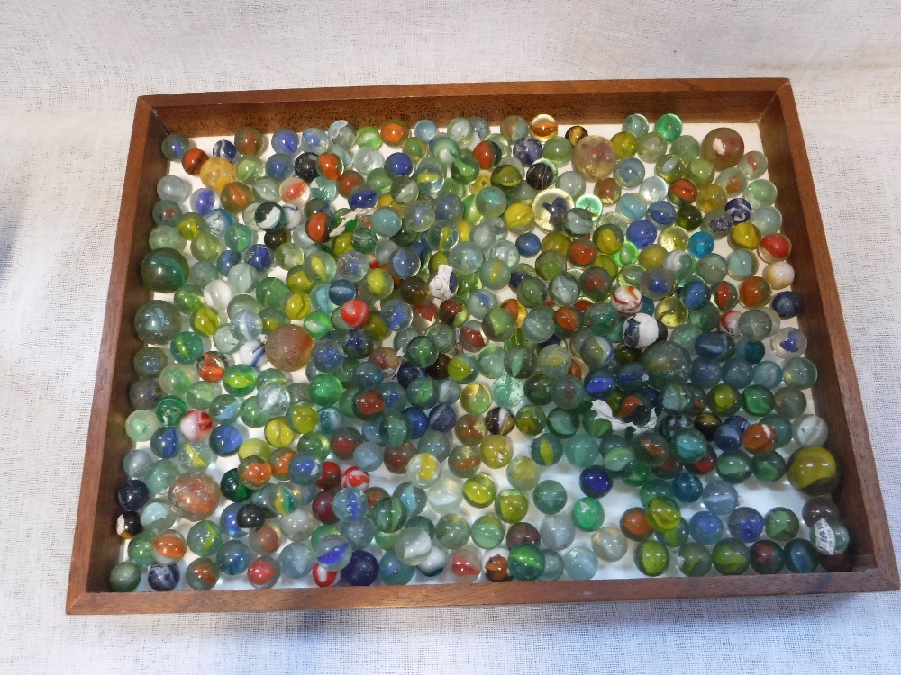 A COLLECTION OF GLASS MARBLES