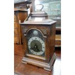 A 1930S BRACKET CLOCK in a burr walnut case, with brass face and silver chapter ring, 11.5" high (