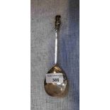 A 17TH CENTURY STYLE BRITANNIA SILVER APOSTLE SPOON with an oval bowl and cast silver finial, in the