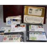 A QUANTITY OF FIRST DAY COVERS, some in albums