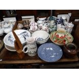 AN ITALIAN SPONGE WARE JUG AND BOWL, a collection of similar ceramics and an Ethnic wooden carving