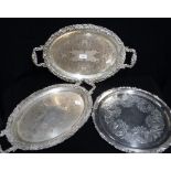 THREE SIMILAR PLATED TRAYS, two oval with cast borders