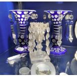 A PAIR OF BOHEMIAN STYLE CUT AND OVERLAID BLUE, WHITE AND CLEAR GLASS LUSTRES and another