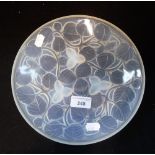 A FRENCH MOULDED GLASS PLATE with moulded signature 'Arrers, Made in France'