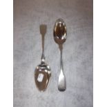 A PAIR OF GEORGE IV SCOTTISH SILVER SERVING SPOONS, with engraved crests, Edinburgh 1826 (2)