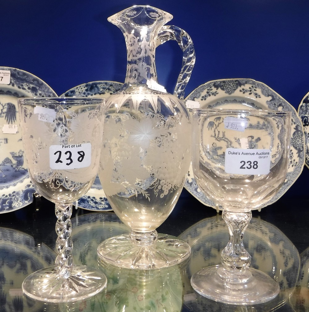 A VICTORIAN ENGRAVED GLASS CARAFE and two similar glasses