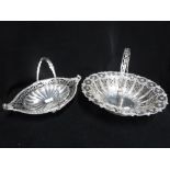 A PLATED SWING HANDLED BREAD BASKET with all over embossed and pierced decoration and another