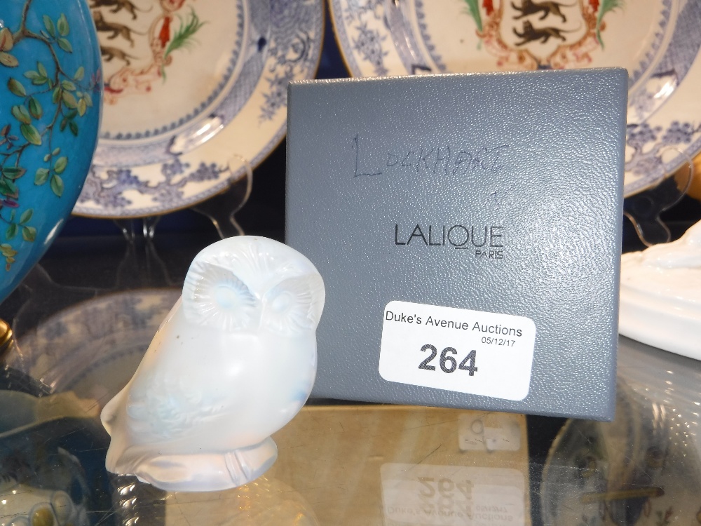 A LALIQUE OPALESCENT GLASS OWL, with signed base, in original box