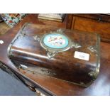 A VICTORIAN FIGURED WALNUT BOX, with central ceramic panel and plated Gothic mounts, 10" wide