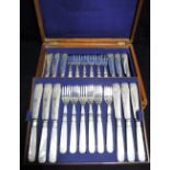 A VICTORIAN MOTHER-OF-PEARL HANDLED DESSERT SET OF KNIVES AND FORKS in fitted box