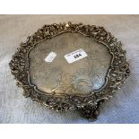 A VICTORIAN SILVER PLATED CARD TRAY with a heavy rococo and floral encrusted border on floral leaf