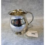 A SILVER CHRISTENING MUG engraved 'Penelope', Birmingham 1920, 8.5cms high