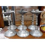 SIX PEWTER CANDLESTICKS