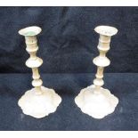 A PAIR OF 18TH CENTURY BRASS CANDLESTICKS, on lobed bases, 8'' high