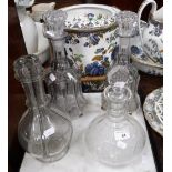 A GLASS DECANTER divided into quarters and others similar