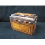 A GEORGE III TEA CADDY, with parquetry and crossbanded panels, the interior fitted with three