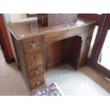 A GEORGE III STYLE KNEEHOLE DESK, 32" high x 44" wide