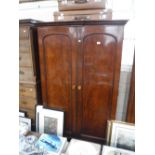 A VICTORIAN MAHOGANY DOUBLE WARDROBE with cut amber glass knobs, 71.5" high x 47" wide