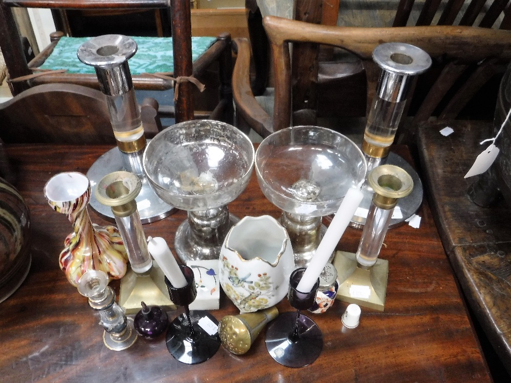 A PAIR OF CHROME CANDLESTICKS, two 1960s purple glass Wedgwood candlesticks and similar items