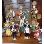 A COLLECTION OF PORTUGESE POTTERY FIGURES OF SAINTS and similar figures