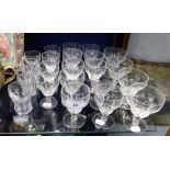 A LARGE COLLECTION OF FACET CUT GLASSES