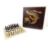Boxed Oriental chess set with Chinese Emperors and Warriors, the box with bird design top, the box