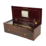 Nicole Freres inlaid rosewood Swiss music box, the hinged lid opening to reveal a 13inch brass