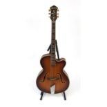 Vintage Hofner President acoustic guitar, with Mother of Pearl floral inlay, paper label and