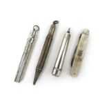 Group of silver items comprising two silver propelling pencils, Mother of Pearl flanked silver